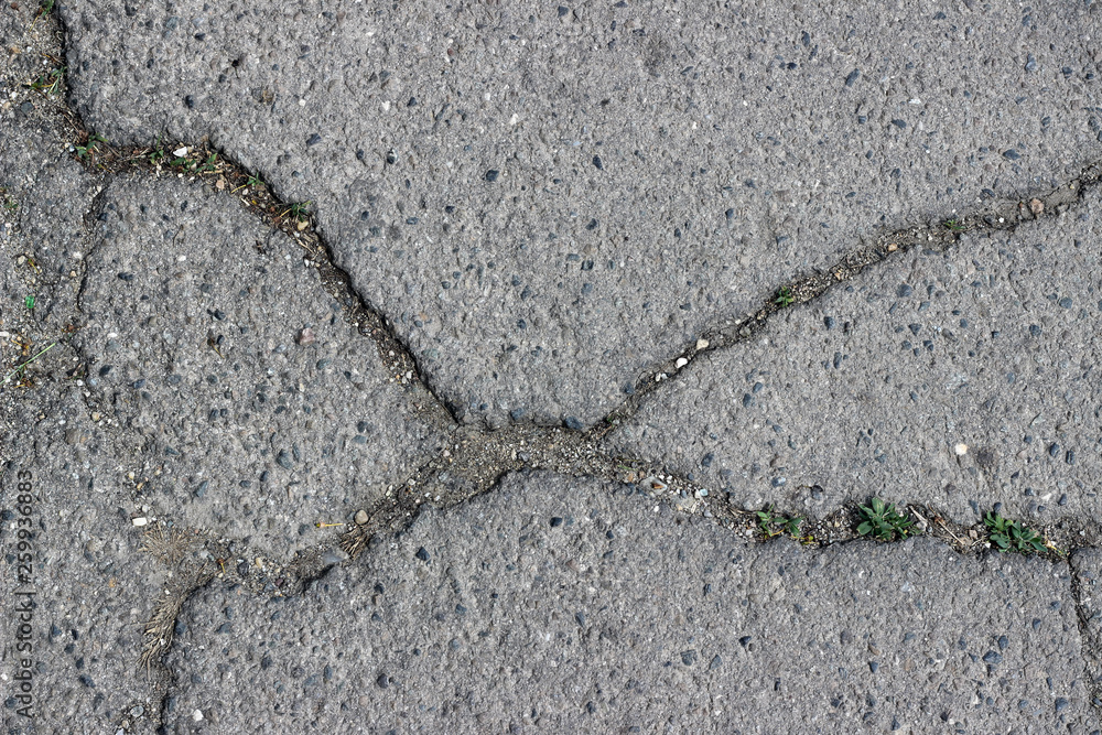 Fototapeta premium Asphalt cracks fracture surface texture