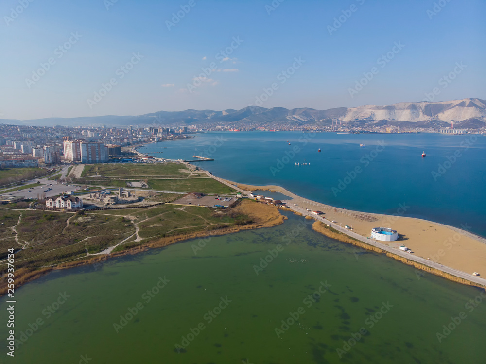 picturesque landscape, shooting from a bird's aerial view of Novorossiysk, mountains, spit. picturesque landscape, shooting from a bird's aerial view of Novorossiysk, mountains, spit.