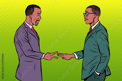 african businessmen game rock paper scissors