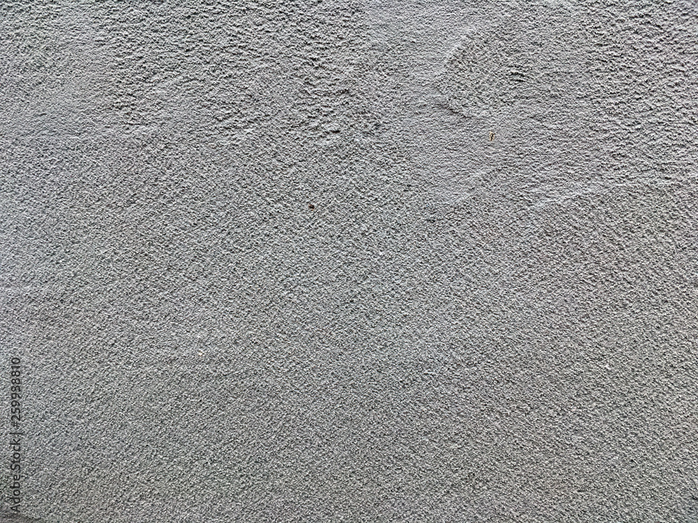 Uneven putty texture. Rough and grungy background of putty Uneven putty texture. Rough and grungy background of putty