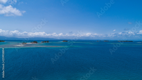 Aerial View to San Blas island of Panama. The San Blas islands of Panama is an archipelago comprising 365 island and cays of which 49 inhabited.