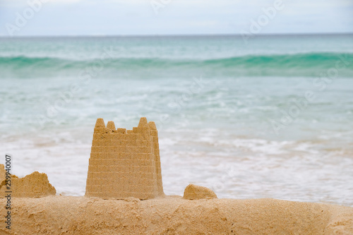 Sand castle on the background of the sea © Eduard Vladimirovich