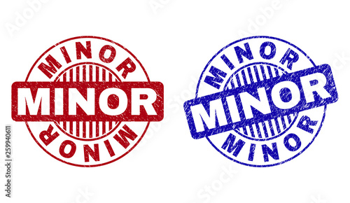 Grunge MINOR round stamp seals isolated on a white background. Round seals with grunge texture in red and blue colors. Vector rubber imitation of MINOR label inside circle form with stripes.