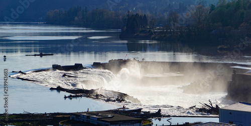 Willamette Falls waterfall on the Willamette River in Oregon City, Oregon generates electric power and once powered several paper mills on the banks.