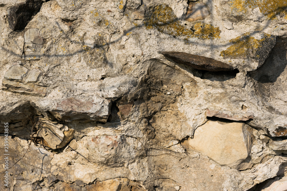 Fototapeta premium old rough stone wall background