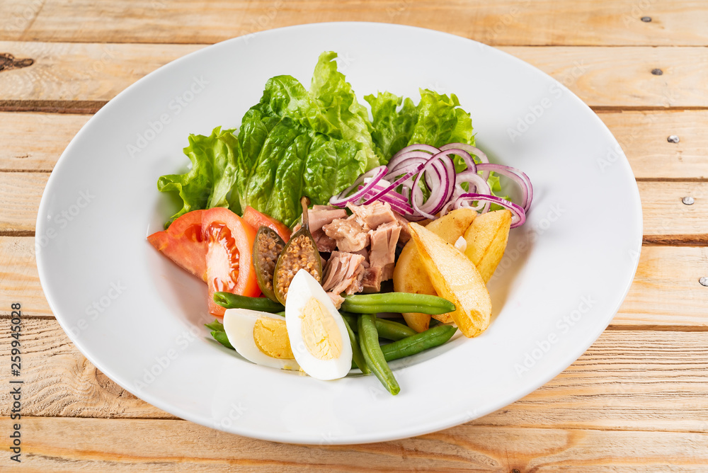 tuna salad on the wooden background