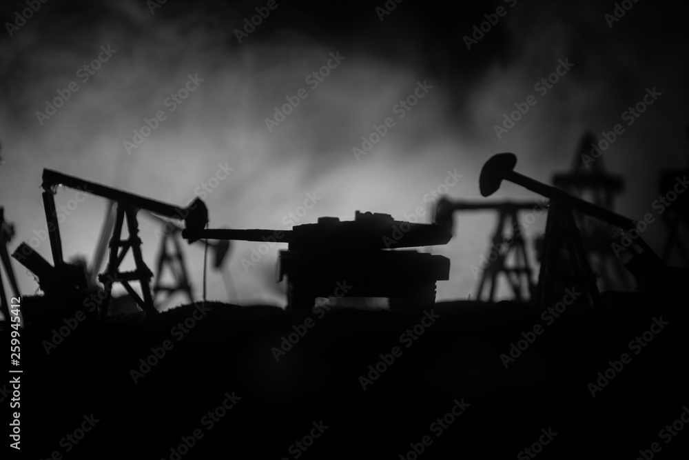 Silhouette of military soldier or officer with weapons. shot, holding gun, colorful sky, background. war and military concept. Silhouette of military soldier or officer with weapons. shot, holding gun, colorful sky, background. war and military concept.