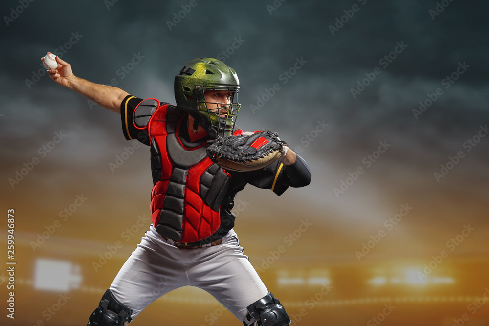 Professional baseball player in action on grand arena in evening during a game.