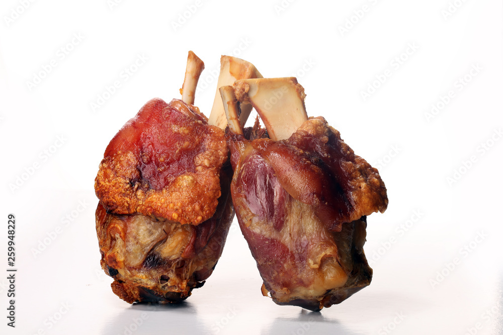 Roasted pork knuckle. Ham and bacon are popular foods in the west. Roasted pork knuckle. Ham and bacon are popular foods in the west.
