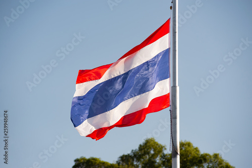 modern flag of Thailand on the flagpole