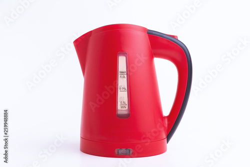 Product concept. Photo of red electric kettle on white background