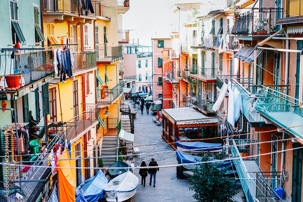 Streets with Boats and Laundry in Corniglia Italy