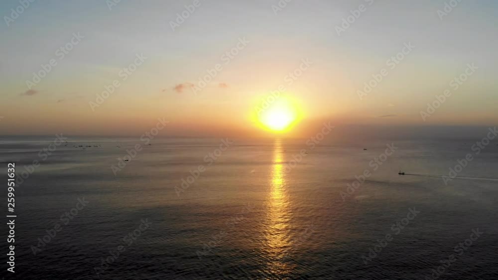 Sunset over the ocean in Bali, colorful down over the sea, Colorful sunset over the sea Bali, Indonesia Sunset over the ocean in Bali, colorful down over the sea, Colorful sunset over the sea Bali, Indonesia