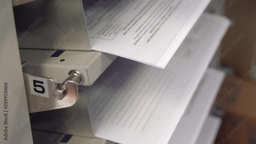 Preparation of equipment for printing books and booklets. Professional printer carriage movement. Printed sheets. Printing on clean sheets. Preparation of equipment for printing books and booklets. Professional printer carriage movement. Printed sheets. Printing on clean sheets.