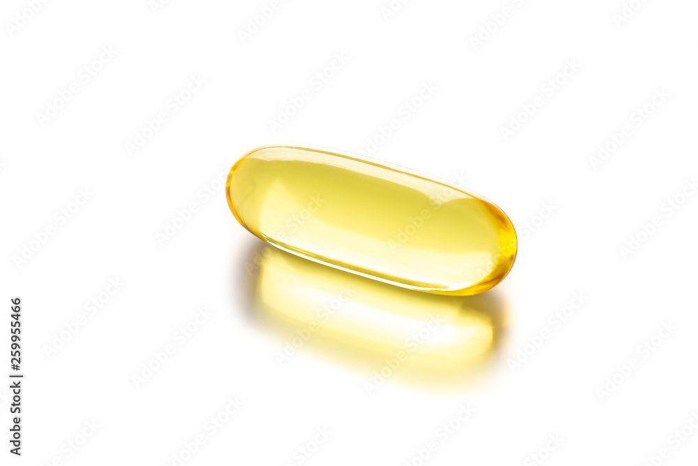 Close up of food supplement oil filled softgel/capsules suitable for fish oil, omega 3-6-7-9 on white background. Concept Healthy lifestyle Close up of food supplement oil filled softgel/capsules suitable for fish oil, omega 3-6-7-9 on white background. Concept Healthy lifestyle