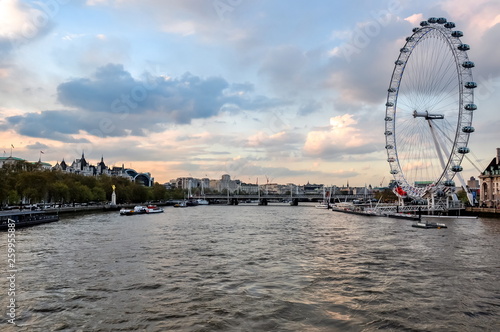 London Eye (Millenium wheel) and Thames river at sunset, London, UK