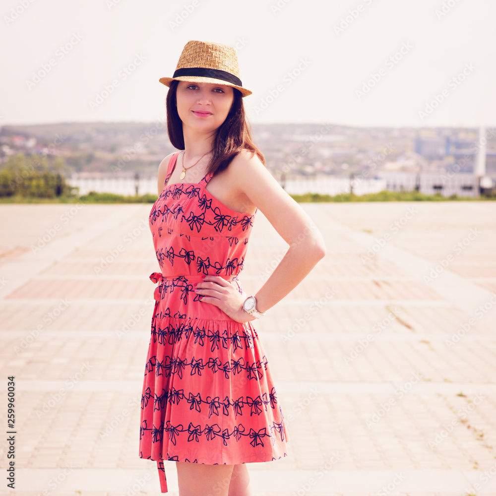 young sexy summer girl wearing a hat