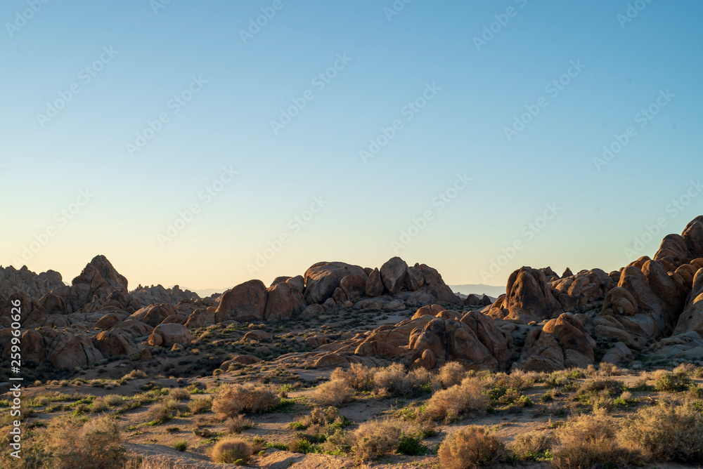 Fototapeta premium morning sunlight on rock formations in the Alabama Hills, Eastern Sierra Nevada mountains, Lone Pine, California, USA