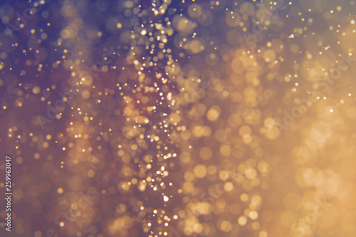 Glitter lights abstract background. Defocused bokeh illustration © ARTYuSTUDIO