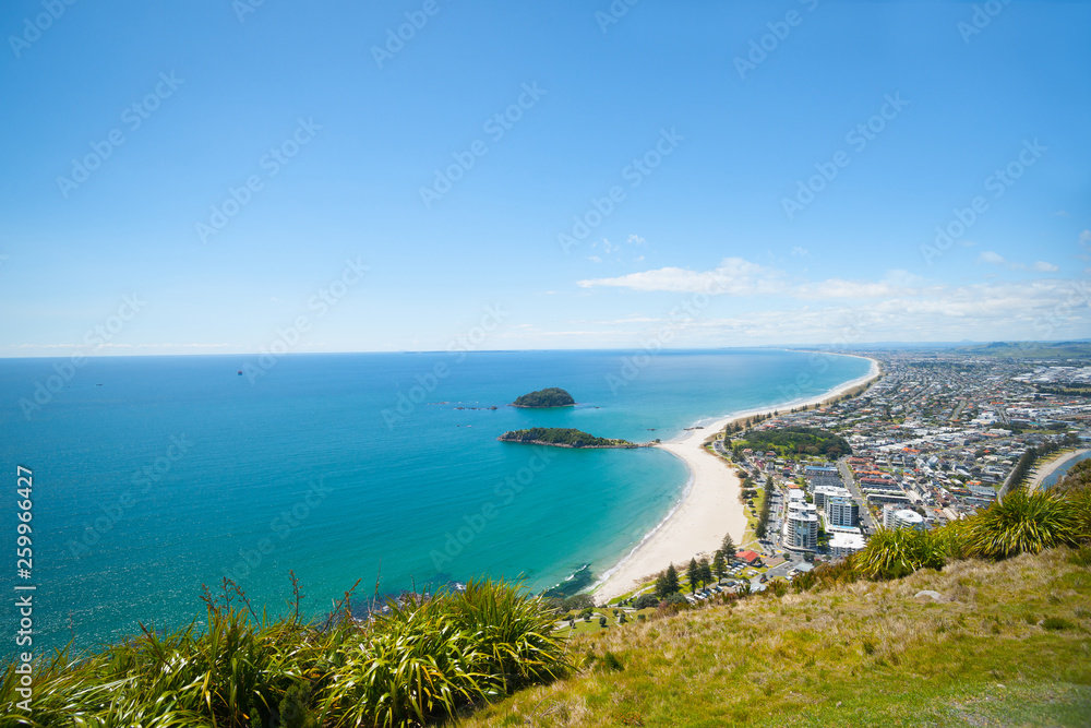 View along long white sand beaches of Bay of Plenty, View along long white sand beaches of Bay of Plenty,