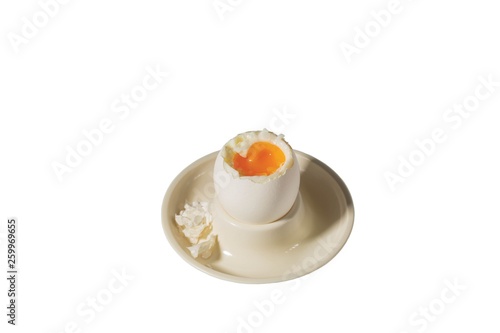Close up view of cooked egg in holder. Healthy eating concept. Breakfest background.