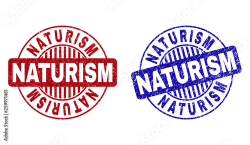 Grunge NATURISM round stamp seals isolated on a white background. Round seals with grunge texture in red and blue colors. Vector rubber imprint of NATURISM title inside circle form with stripes.