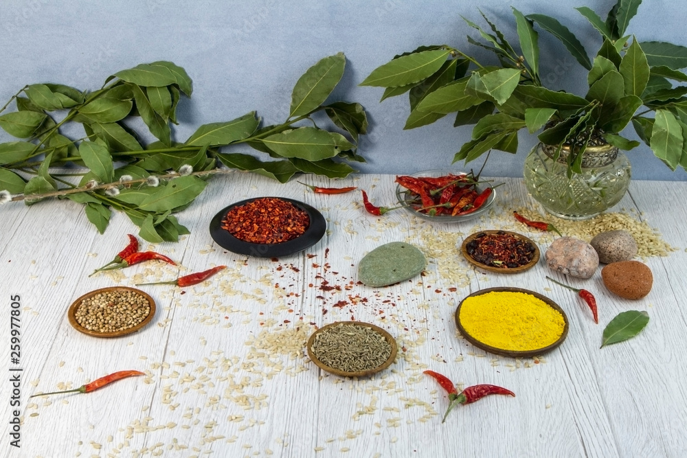 Spices and seasonings on the wooden table