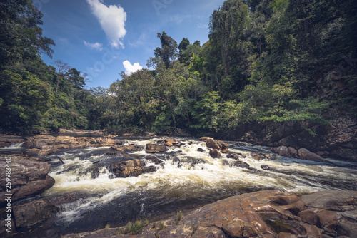 Lata Berkoh or Berkoh Waterfall in the Kuala Tahan National Park (Taman Negara) in Pahang, Malaysia. photo