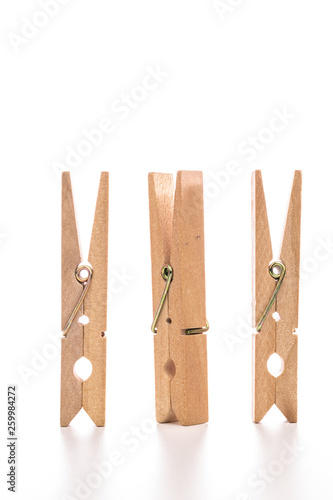 Wood clothespins isolated on white background object concept