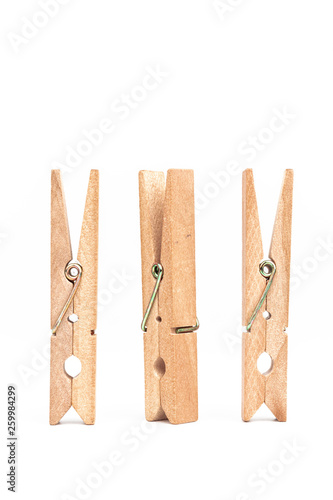 Wood clothespins isolated on white background object concept