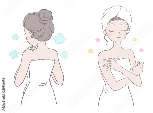 The woman is surrounded by the front and back of the towel, after bathing