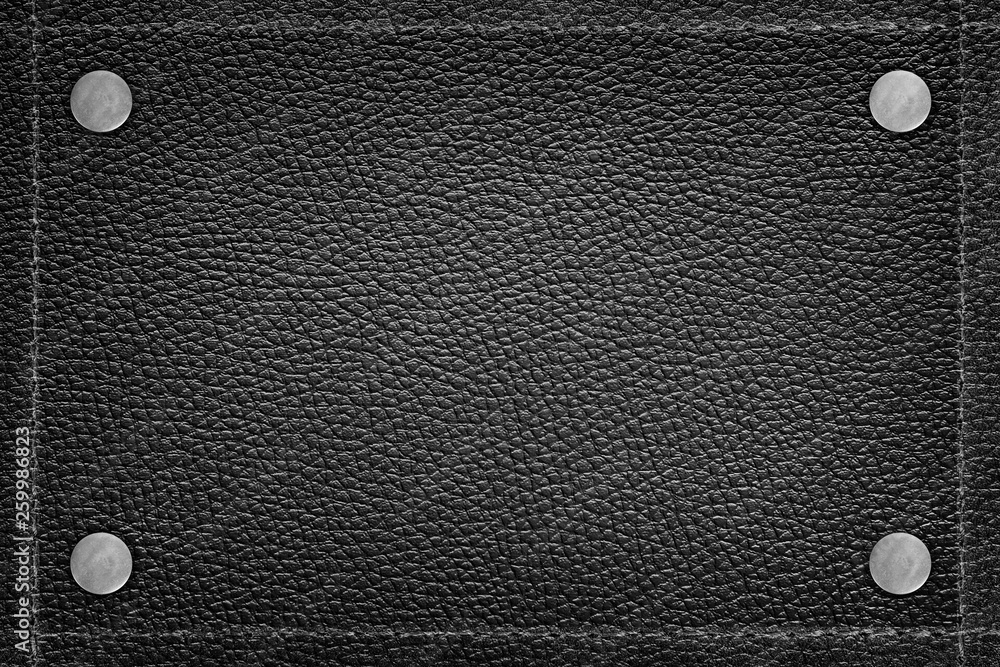 black leather stitched large thread and pins on Leather texture background black leather stitched large thread and pins on Leather texture background
