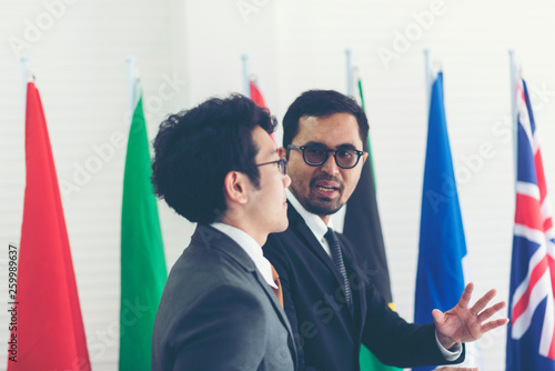 Asian businessman standing ...