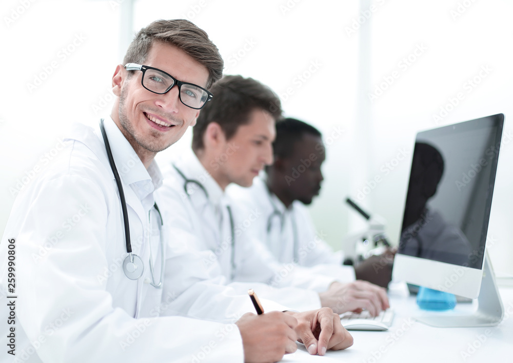 group of doctors conducting laboratory studies group of doctors conducting laboratory studies