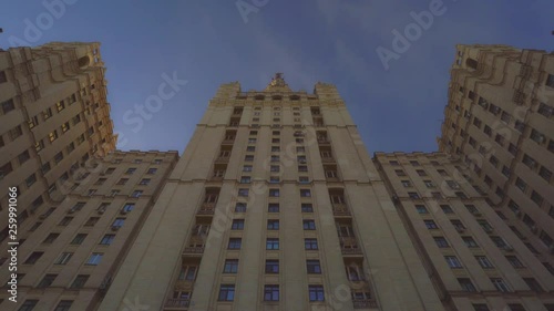 View of the facade. Top to bottom. The image in the frame is symmetrical. One of the seven Stalin's skyscraper. Moscow Russia. With a Star on top. Ultra HD footage photo