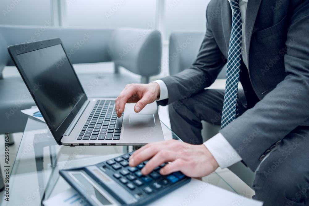 close up.businessman analyzing financial data. close up.businessman analyzing financial data.