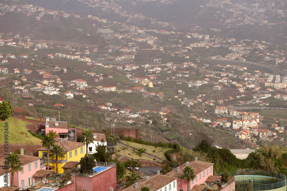 Panorama from high point on Funchal city of Madeira island. Cropped shot, top view, free space for text, horizontal. The concept of nature and travel.