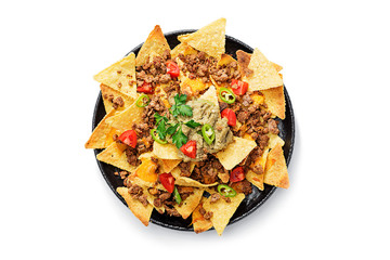 Corn chips nachos with fried minced meat and guacamole isolated on white background.