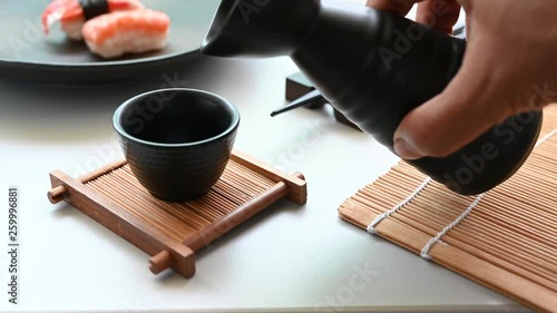 Asian men Pouring japanese sake oriental drink style 4K footage