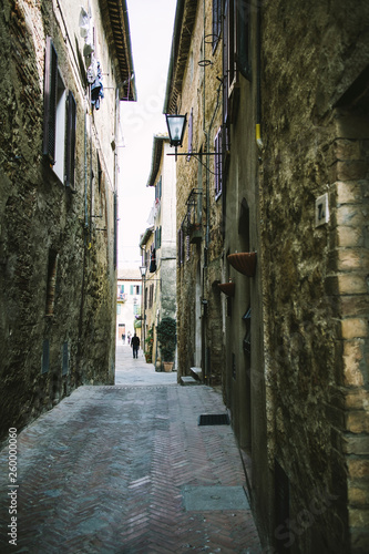 Narrow street on a medieval town in Tuscany