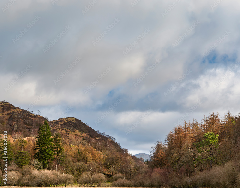 Stunning Spring landscape image of Yew Tree Tarn in UK Lake District Stunning Spring landscape image of Yew Tree Tarn in UK Lake District