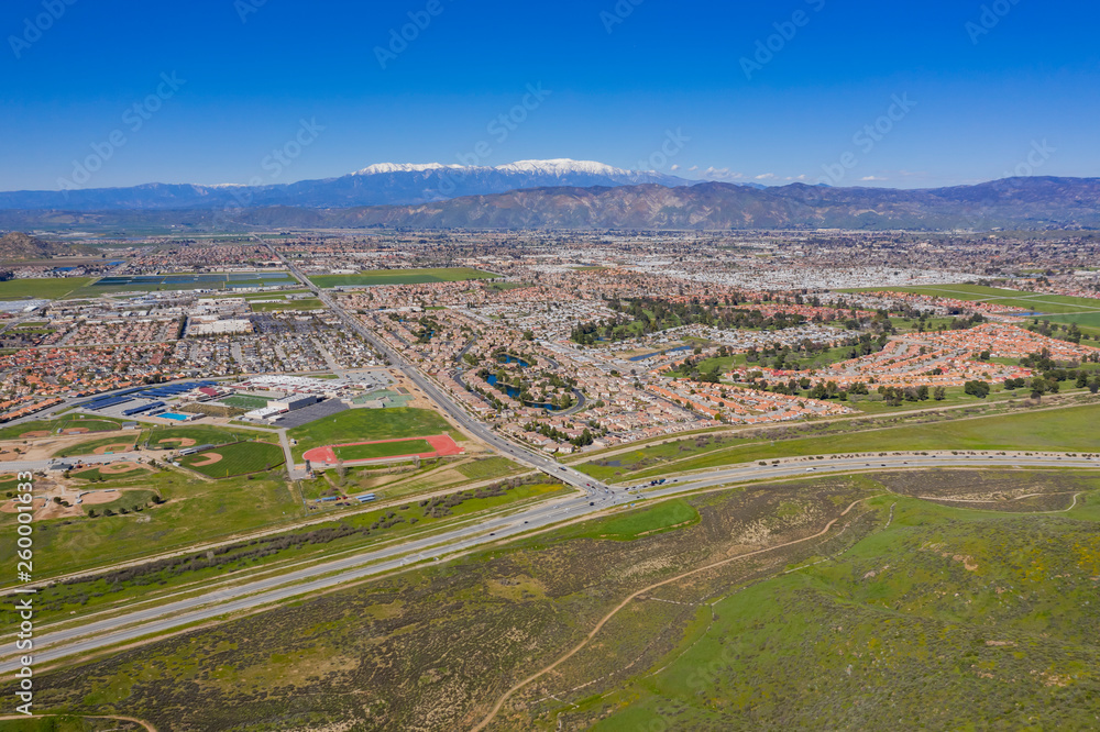 Aerial view of Hemet cityscape and wild flower blossom