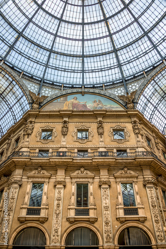 Geometrical and historical Interior of Galleria Vittorio Emanuele II in front of Cathedral of Milano  Milan  Italy