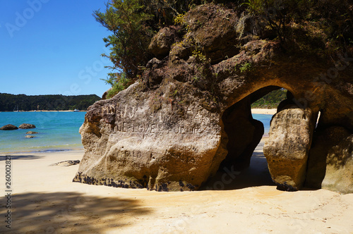 Gate through rock on beach in South island in New zealand