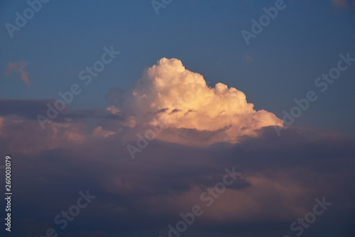 Summer evening. Beautiful cumulus at sunset