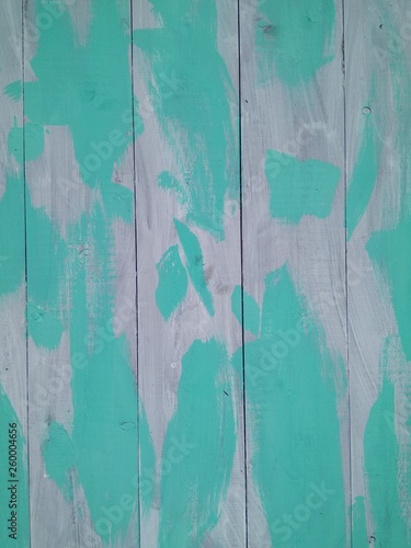The grey and turquoise brush stroke wood texture with natural patterns background