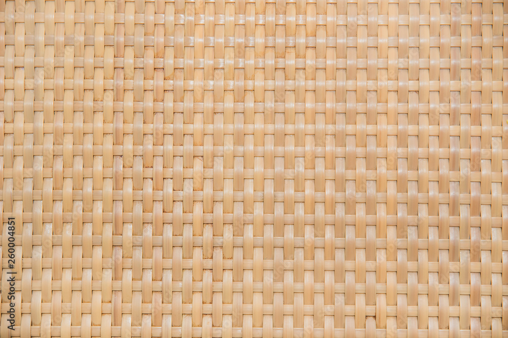 Wall with wicker vines, rattan background of brown color. Wall with wicker vines, rattan background of brown color.
