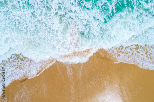Beach aerial view with turquoise sea wave