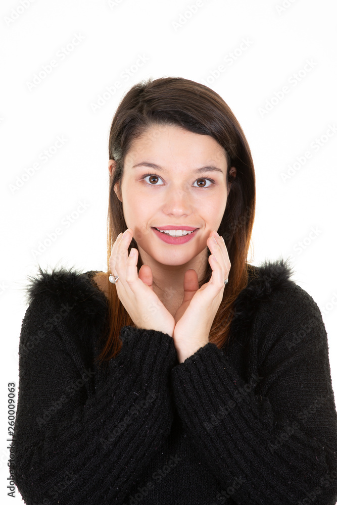 Portrait of young beautiful smiling woman looks in camera Portrait of young beautiful smiling woman looks in camera