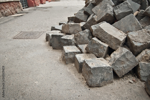 Paving the street in the city. Replacement of old paving tiles. Repairs. Chernivtsi, Ukraine, Europe, March 2019.